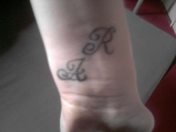 Nieces initials tattoo