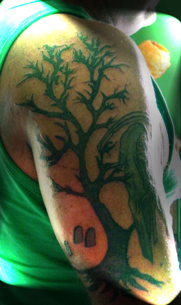 Ominous tree tattoo