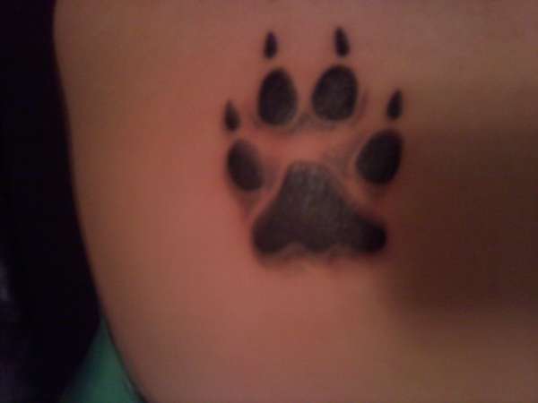 Wolf paw print tattoo