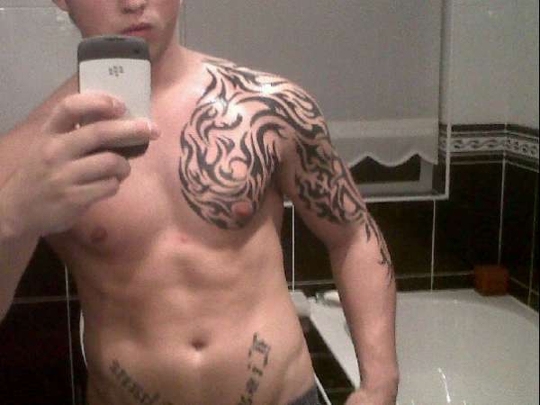 chest/arm peice tattoo