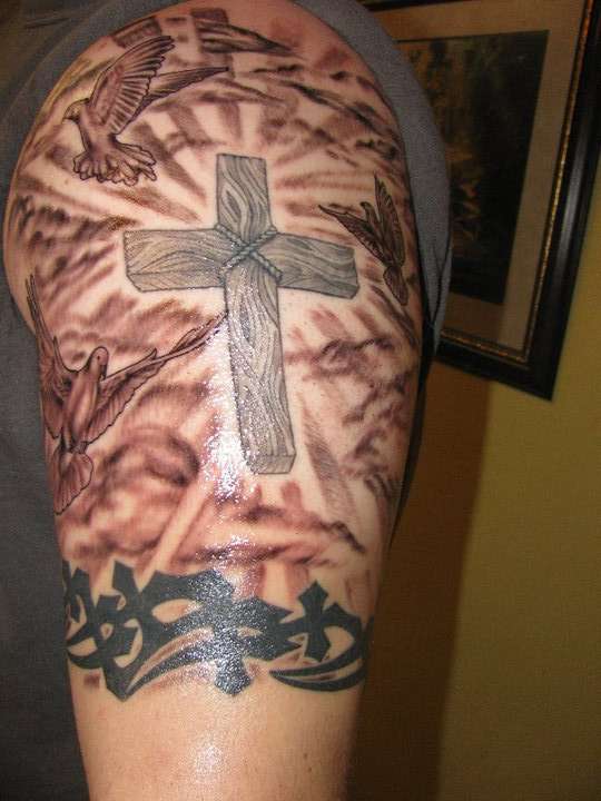 cross and doves tattoo
