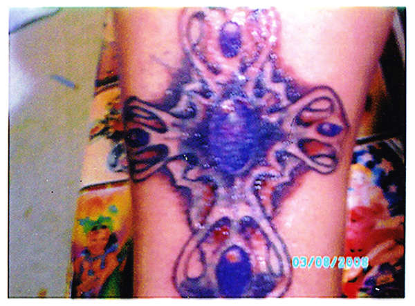 cross cover up tattoo