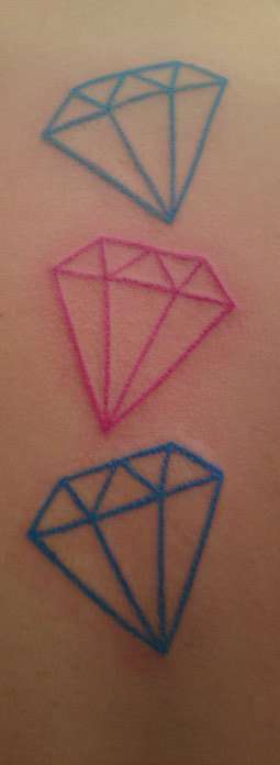 diamonds on my back, for my bros and sis. tattoo