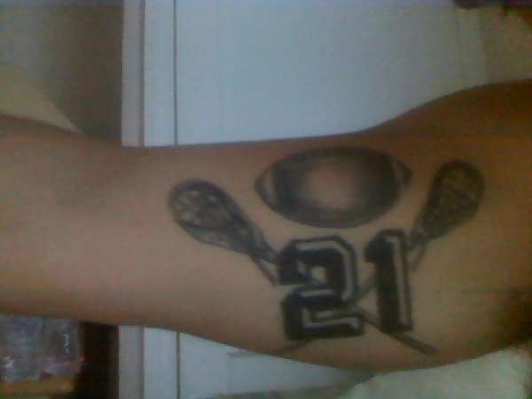 football and lacrosse tattoo