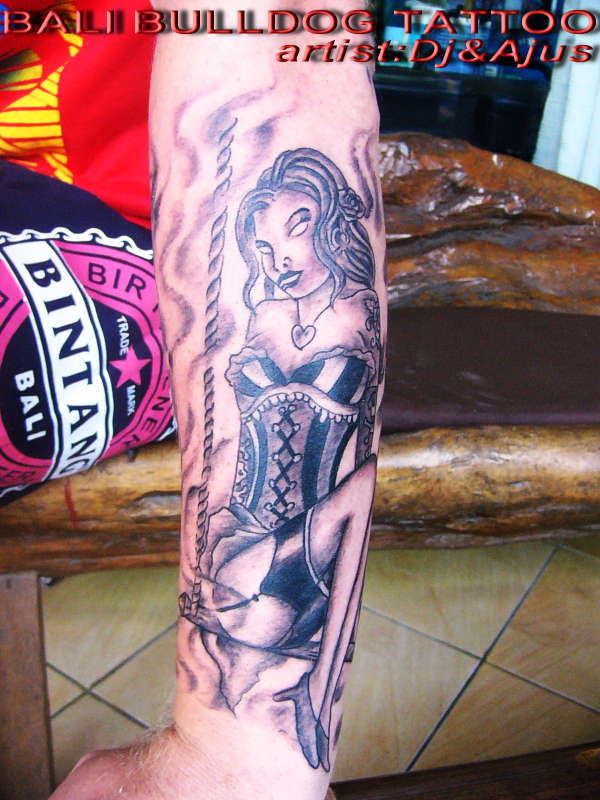 girl on swing tattoo