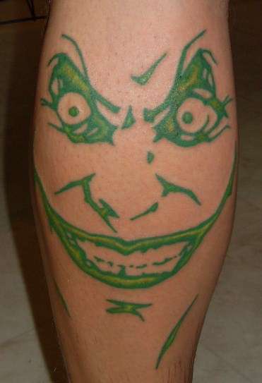 green joker face tattoo