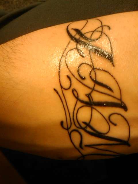 jam mu initials tattoo