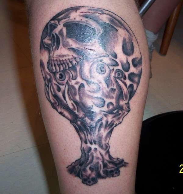 skull/crystal ball tattoo