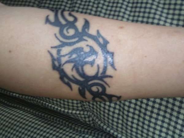 tribal dragon band tattoo