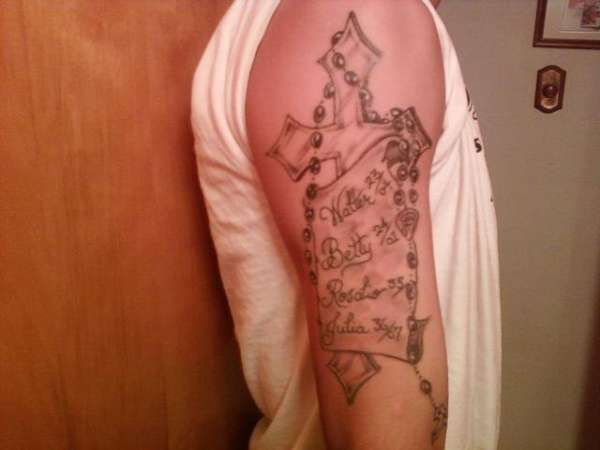 Cross with rosary tattoo