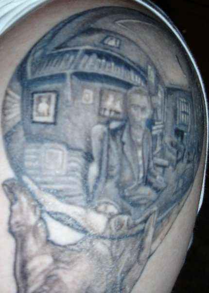 M.C. Escher - Hand holding Sphere tattoo