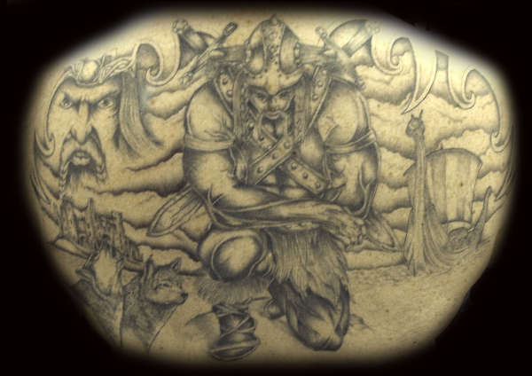 Top part of a Viking back piece tattoo