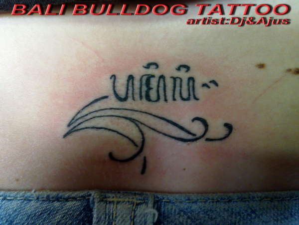 balinese lettering mean family tattoo