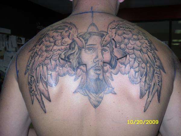 cross with wings tattoo