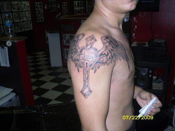 cross with wings tattoo