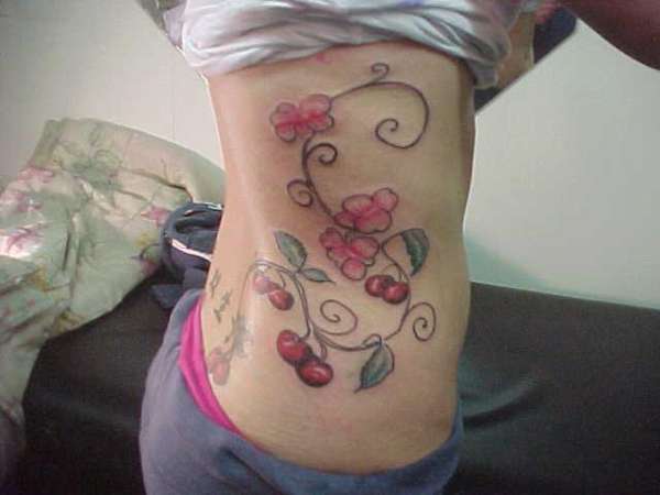 flowers and cherries tattoo