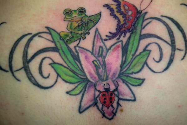frog hitting on a buttterfly tattoo