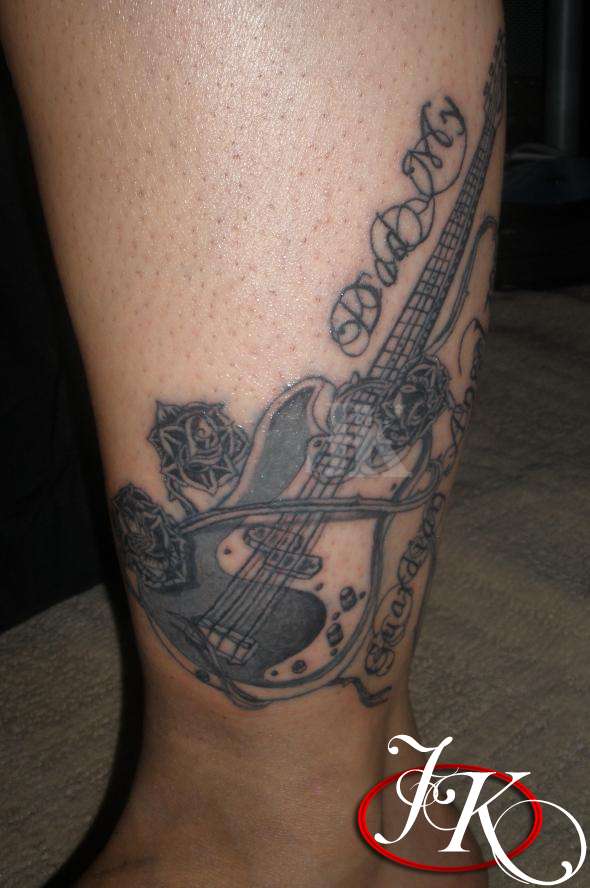 GUITAR MEMORIAL TATTOO FRONT VIEW BY JUSTIN KONTRA tattoo