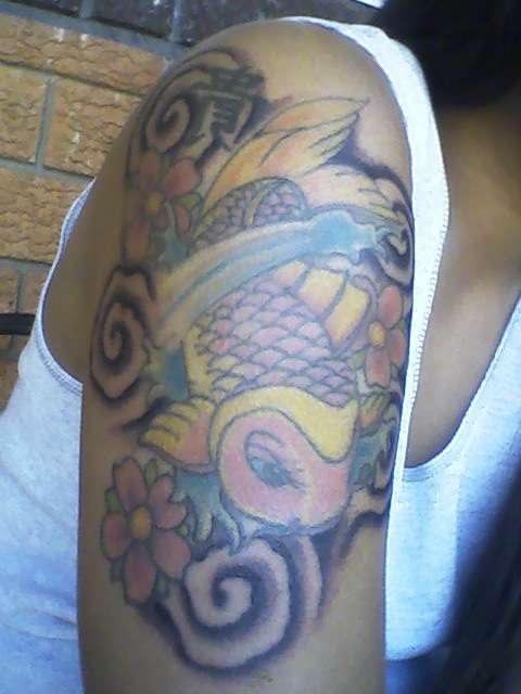my new addition to my koi tattoo