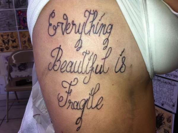 my side tat tattoo