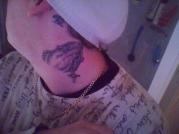 praying hands tattoo