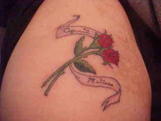 rose and some names tattoo