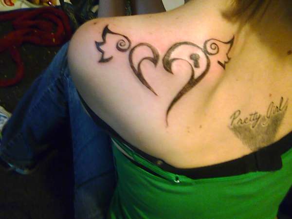 tribal heart tattoo