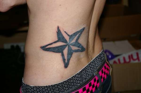 weathered nautical star tattoo