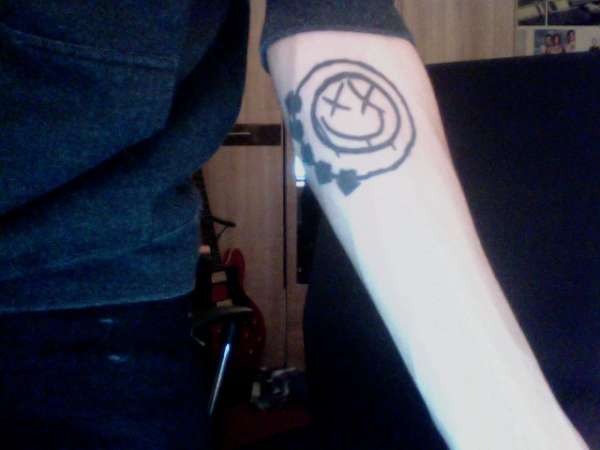 Blink 182 smiley tattoo