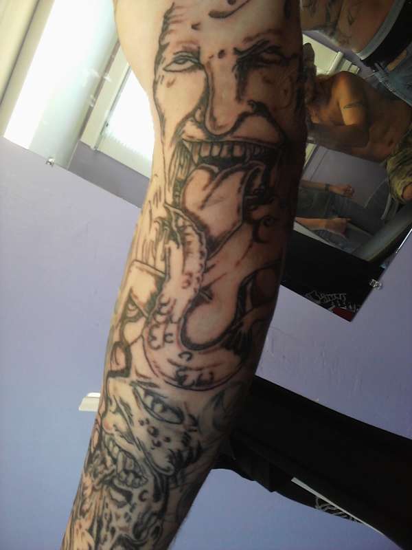 Demon sleeve tattoo