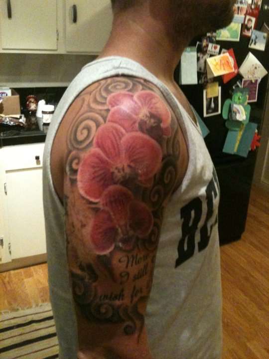 Orchids in process tattoo