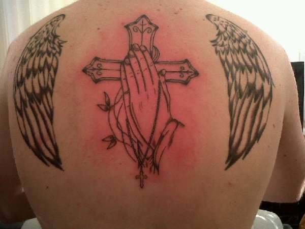 Wings an Cross tattoo