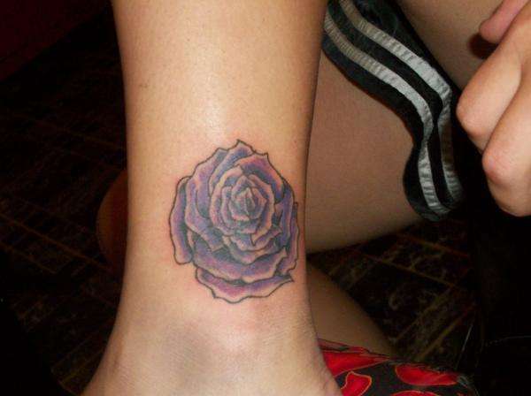 rose cover up tattoo