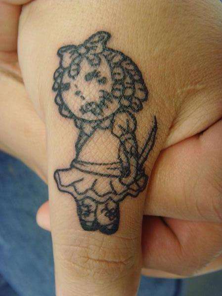 thumb doll tattoo