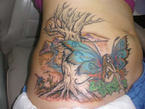 FAIRY SITTING IN A TREE tattoo