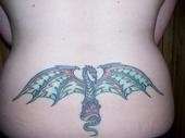 Grey Dragon on Lower Back tattoo
