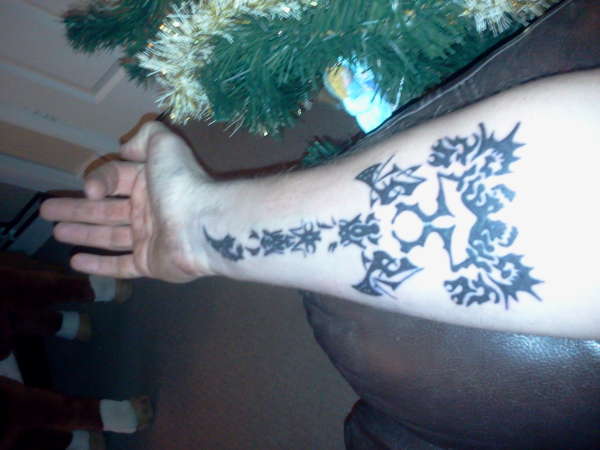 Guitar tribal tattoo