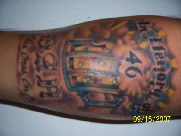 In Memory of Dan tattoo