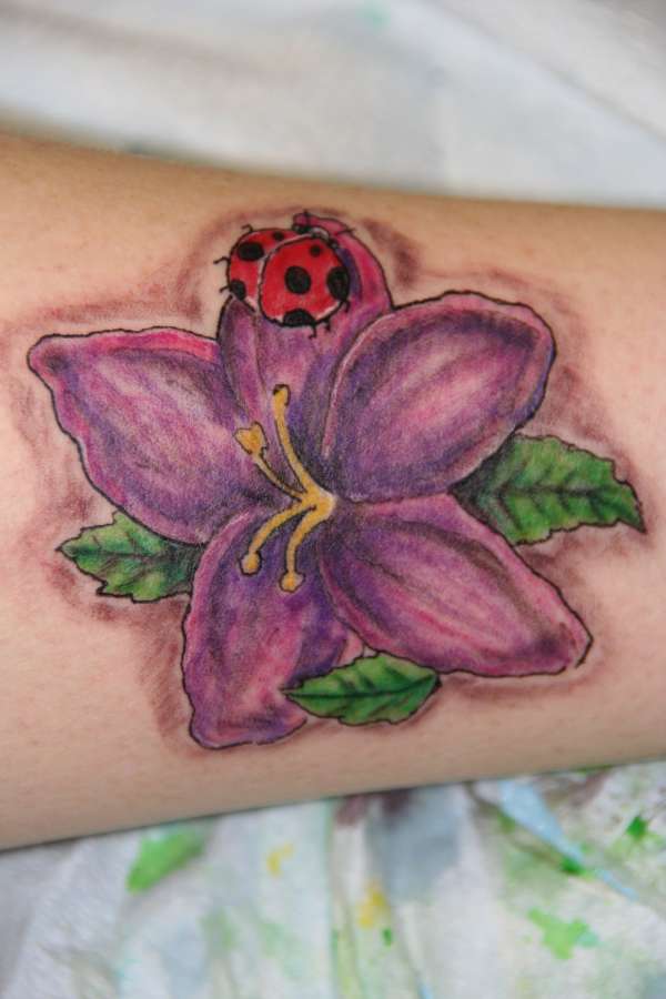 Lilly with Lady Bug tattoo
