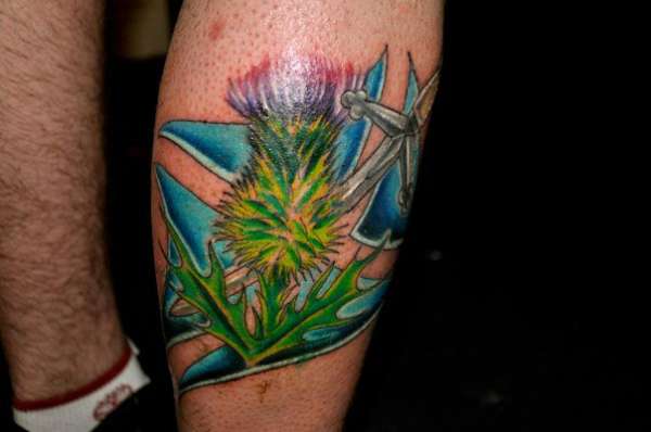 Scottish flag, thistle and claymore sword tattoo