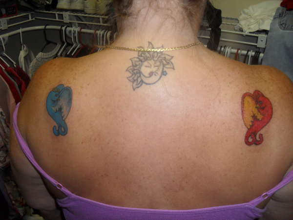 lalas...  angel & devel .moon & sun tattoo