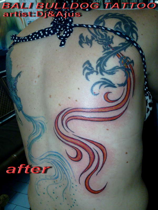dragon after tuch up tattoo