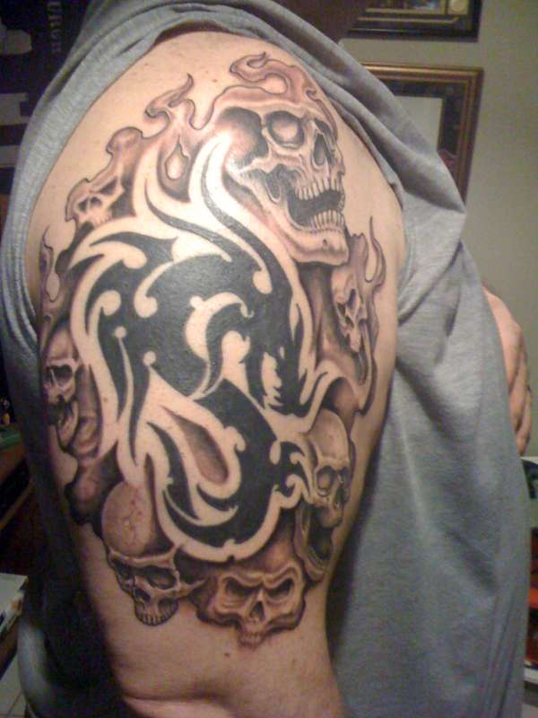 dragon and skulls tattoo