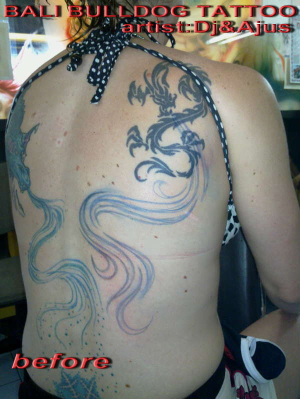 dragon before tuch up tattoo