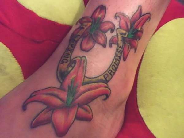 horseshoe & lilies tattoo