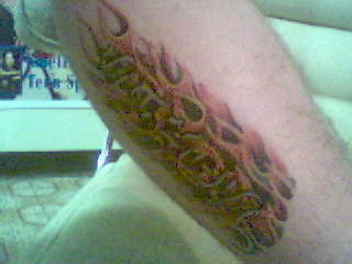 Flaming name tattoo