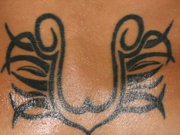 teh small of my back tattoo