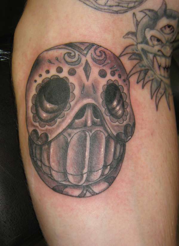 weird skull thing tattoo