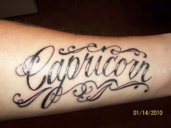 capricorn tattoo on arm