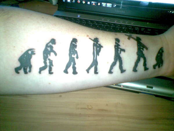 De-evolution of man by religion tattoo